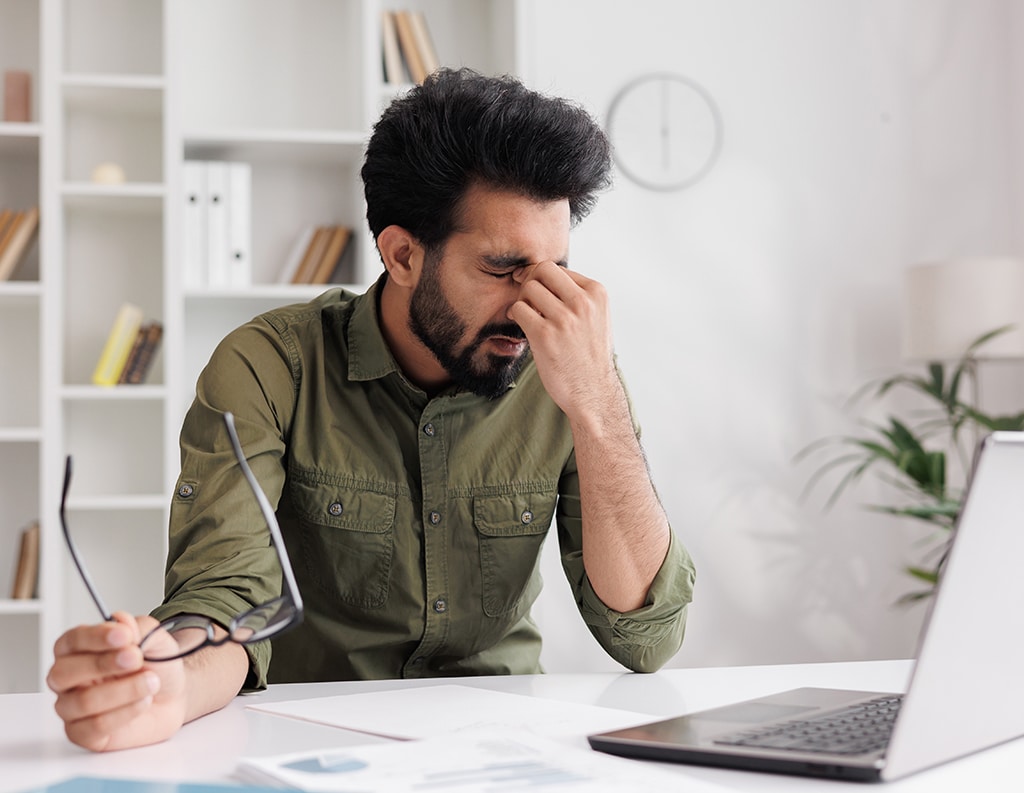 Man experiencing fatigue